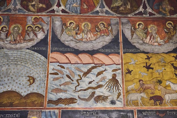 Church fresco decorates the wall with scenes from the sea and the sky, depicting the Creation,