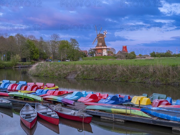 The Greetsiel twin mills, in front boats in the new Greetsieler Sieltief, Greetsiel, Krummhoern,