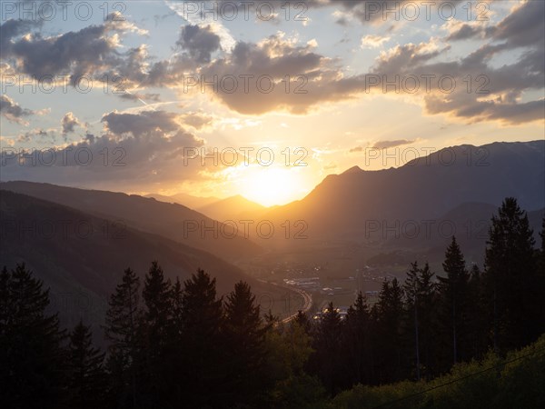 Sunset over the Liesingtal, in the evening light the village of Traboch, Schoberpass federal road,