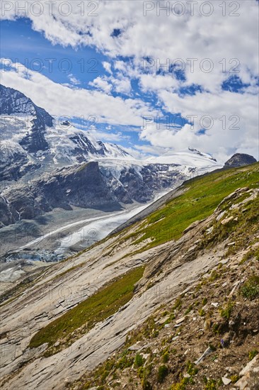 View from Franz Joseph Hoehe into the mountains (Grossglockner) with Pasterze on a sunny day at