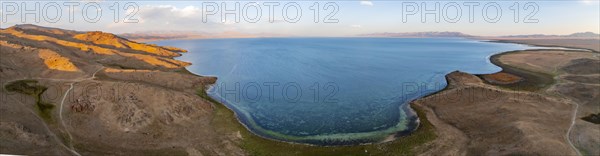 Aerial view, Vast empty landscape at the mountain lake Song Kul, Moldo Too Mountains, Naryn region,