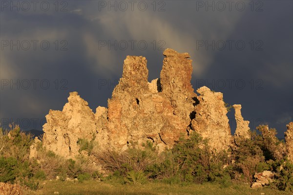 Dramatic rock formations against a cloudy sky at dusk, Mono Lake, North America, USA, South-West,