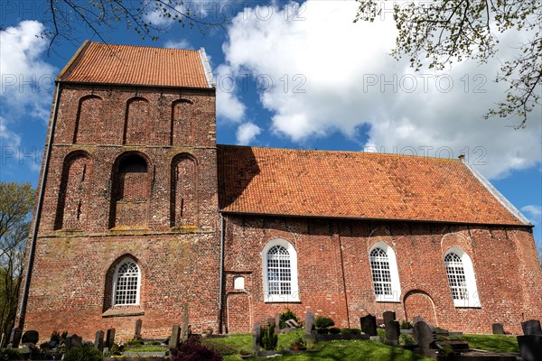 Protestant Reformed Church in Suurhusen, famous leaning church tower, municipality of Hinte,