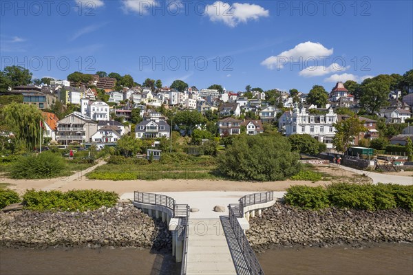 Elbe riverbank with jetty, villas and residential buildings, Blankenese district, Hamburg, Germany,