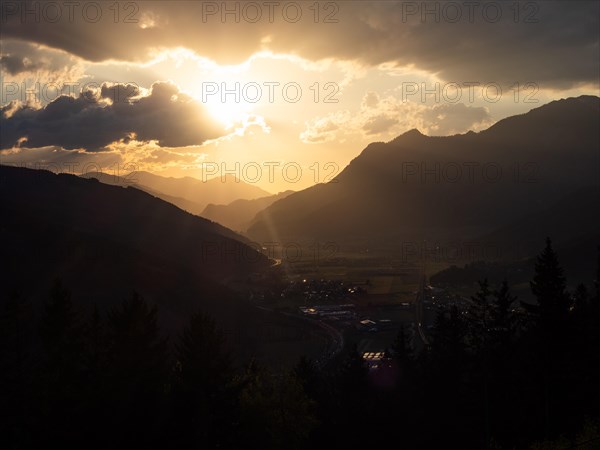 Evening light at sunset over the Liesingtal, in the evening light the village of Traboch,