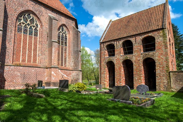 Protestant Reformed Church in Suurhusen, famous leaning church tower, municipality of Hinte,