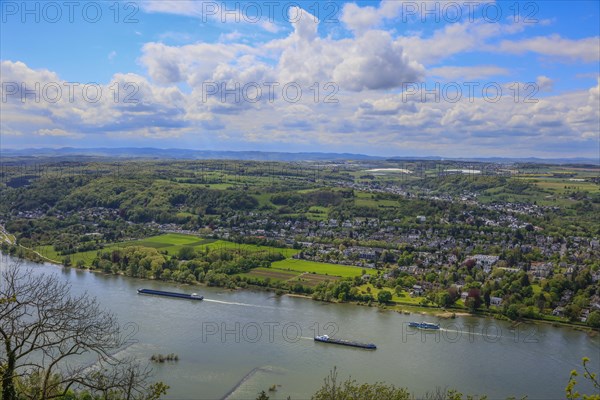 View from Drachenfels, mountain in the Siebengebirge on the Rhine with cargo ships between