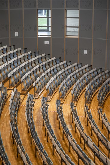 View from above of empty rows of seats in a lecture theatre, interior photo, Department of