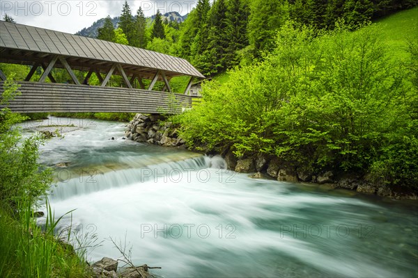 Covered wooden bridge over the Stillach, Stillachtal near Oberstdorf, Allgaeu Alps, Allgaeu,