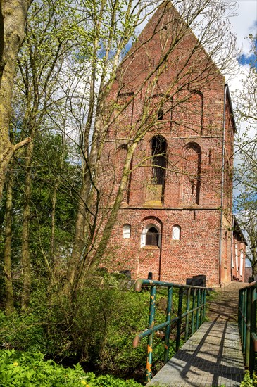 Protestant Reformed Church in Suurhusen, famous leaning church tower, municipality of Hinte,