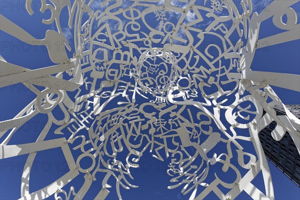 Public art, frog perspective of source sculpture by Jaume Plensa, Montreal, Province of Quebec,