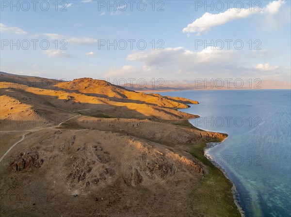 Aerial view, Vast empty landscape at the mountain lake Song Kul, Moldo Too Mountains, Naryn region,