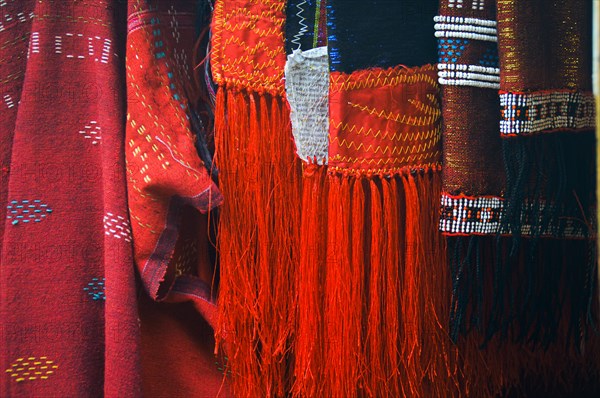 Close-up of traditional Ulos clothes of the Batak people with fringe and intricate indigenous