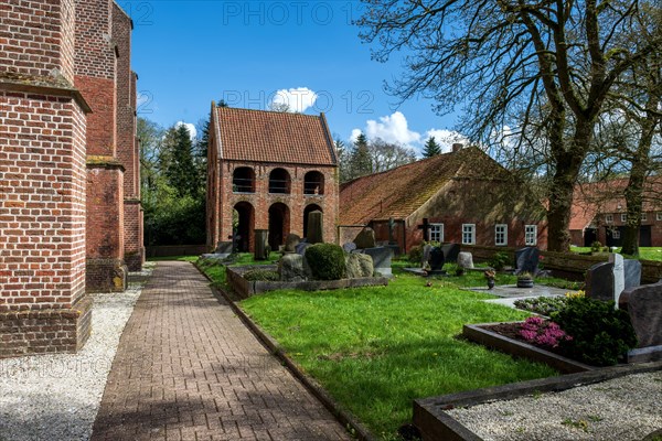 Protestant Reformed Church in Suurhusen, famous leaning church tower, municipality of Hinte,