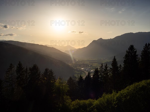 Evening light at sunset over the Liesingtal, in the evening light the village of Traboch,