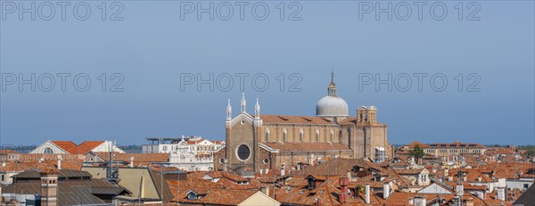 View over the roofs of Venice to the church Basilica dei Santi Giovanni e Paolo, view from the roof