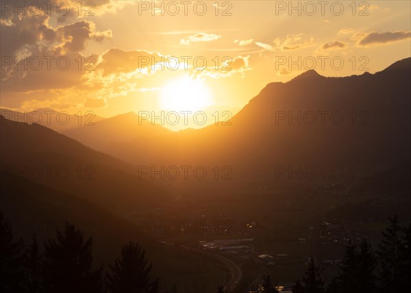 Sunset over the Liesingtal, in the evening light the village of Traboch, Schoberpass federal road,