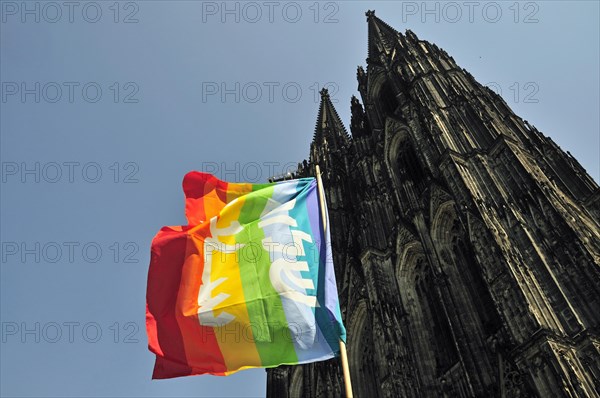 Peace flag and Cologne Cathedral, Cologne, North Rhine-Westphalia, Germany, Europe