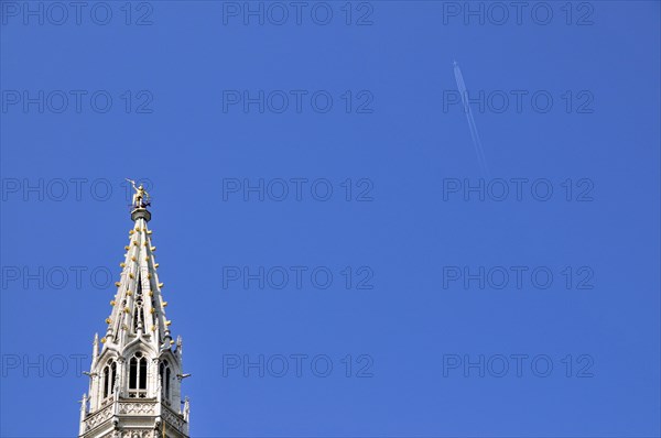 Gilded statue of the Archangel Michael fighting the dragon, the patron saint of the city of