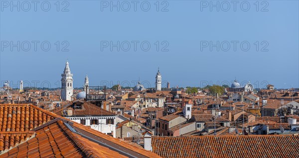 View over the roofs of Venice with many church towers, view from the roof of the Fondaco dei