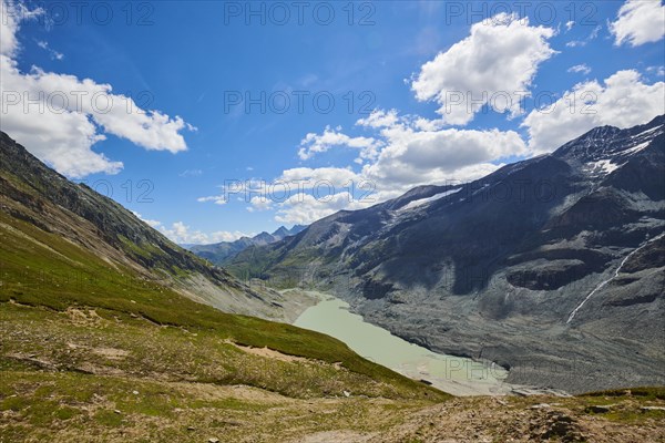 View from Wasserfallwinkelkeesee to Franz Joseph Hoehe into the mountains with Pasterze on a sunny