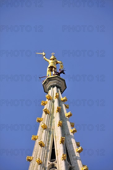 Gilded statue of the Archangel Michael fighting the dragon, the patron saint of the city of