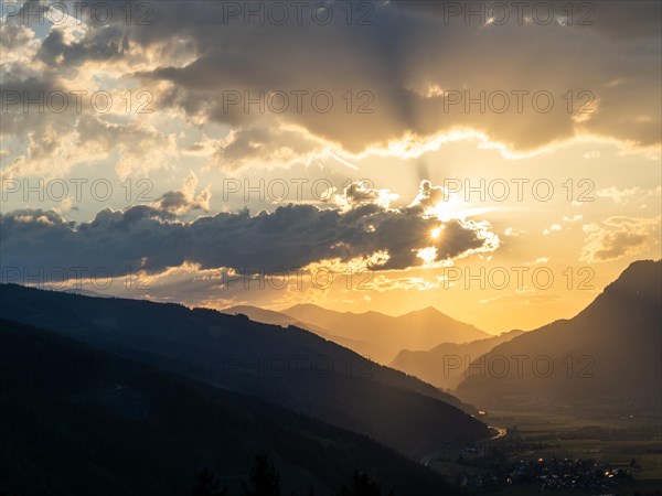 Sunset over the Liesingtal, in the evening light the village of Traboch, Schoberpass federal road,