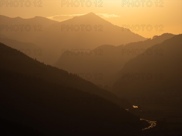 Evening light at sunset over the Liesingtal, in the evening light the village of Traboch,