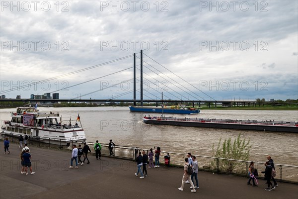 Rheinpromenade, view of the Rheinkniebruecke, Duesseldorf, North Rhine-Westphalia, Germany, Europe
