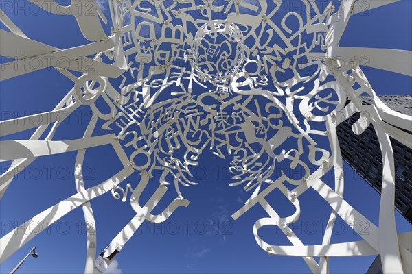 Public art, frog perspective of source sculpture by Jaume Plensa, Montreal, Province of Quebec,