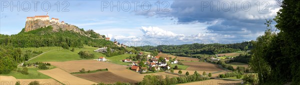 Riegersburg in the evening light, foreground field, panoramic view, cloudy mood, Riegersburg,
