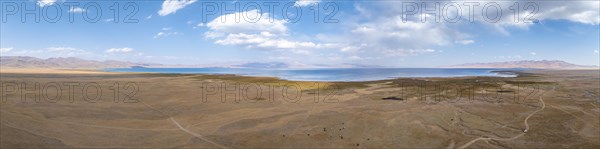 Aerial view, Vast empty landscape at the mountain lake Song Kul in autumn, Moldo Too Mountains,