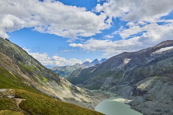 View from Wasserfallwinkelkeesee to Franz Joseph Hoehe into the mountains with Pasterze on a sunny