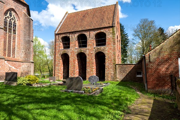 Protestant Reformed Church in Suurhusen, famous leaning church tower, municipality of Hinte,