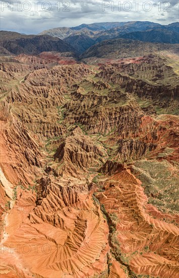Badlands, gorges and mountains, eroded red sandstone cliffs, Konorchek Canyon, Boom Gorge, aerial
