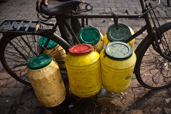 Plastic barrels, water, draw, public water pump, Jharkhand, India, Asia