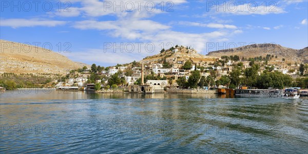 Partly submerged mosque of Eski Halfeti due to the construction of the Birecik dam on the Euphrates