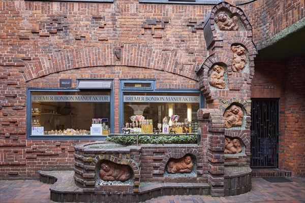 Fountain with seven faults by sculptor Bernhard Hoetger in the Handwerkshof on Boettcherstrasse in
