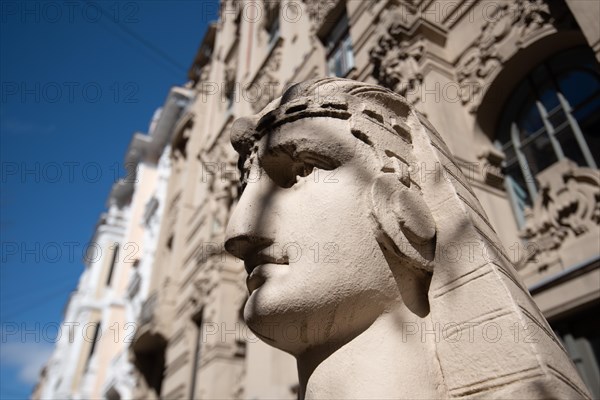 Sphinx in front of Art Nouveau building in Alberta iela in Riga, street is a UNESCO World Heritage