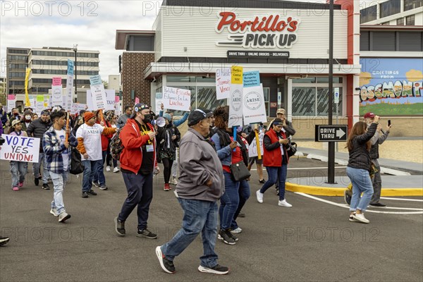 Rosemont, Illinois, Hundreds of workers and supporters picketed a Portillo's restaurant, demanding