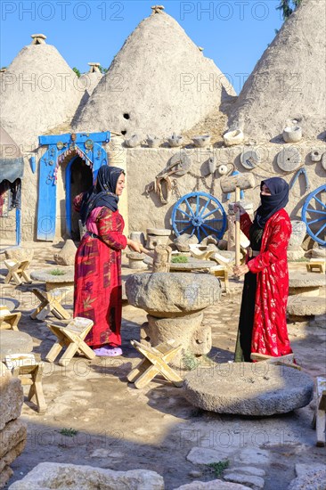 Women in the courtyard, Harran, Turkey, Asia