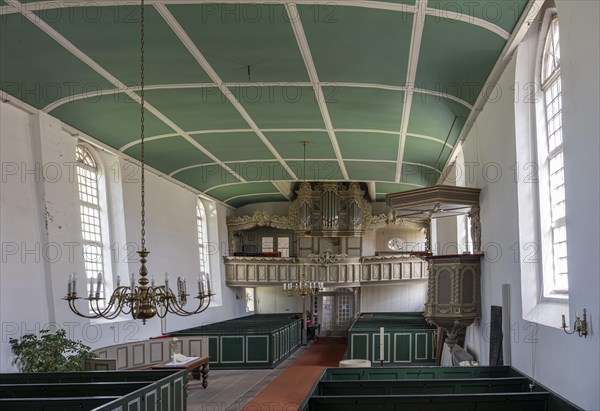 Protestant Reformed Church from 1401, interior with pews, pulpit and organ, Greetsiel, Krummhoern,