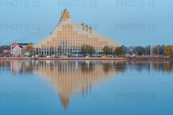 Latvian National Library reflected in the Daugova River, designed and built by Latvian-born US