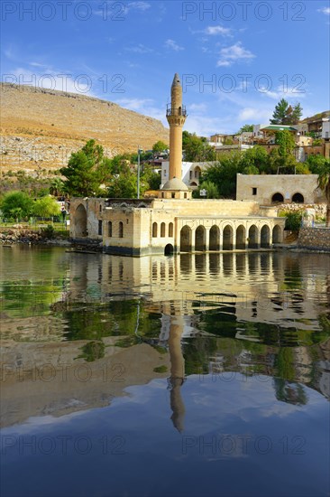 Partly submerged mosque of Eski Halfeti due to the construction of the Birecik dam on the Euphrates