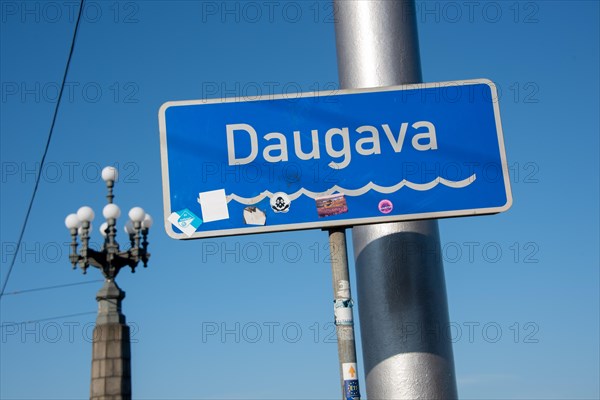 Sign with the inscription Daugava, flows through Russia, Belarus and Latvia, flows into the Baltic