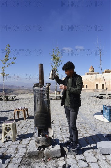 Tea Street seller near the Ishak Pasha Palace, Dogubayazit, Turkey, Asia
