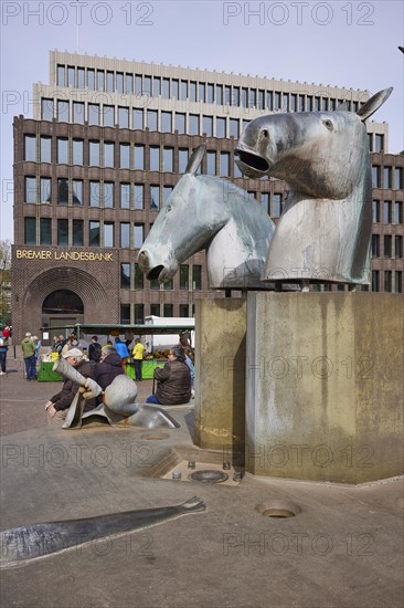 Neptune Fountain by sculptor Waldemar Otto and the Bremer Landesbank at the Domshof in Bremen,