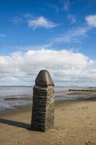 Stone sculpture on the beach and Wadden Sea, penis, artist Eckart Grenzer, Dangast, Jade Bay, North