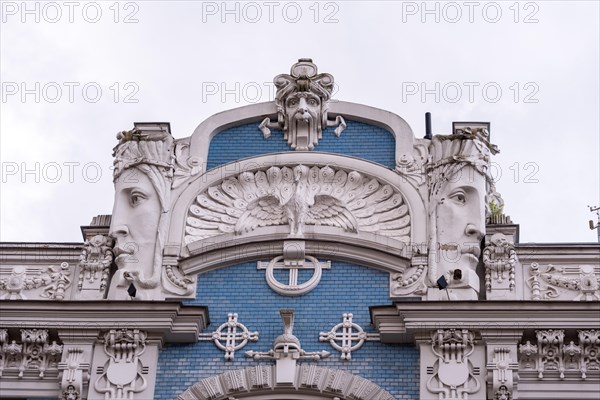 Art Nouveau building, designed by Michail Eisenstein, blue facade with sculptures, Riga, Latvia,