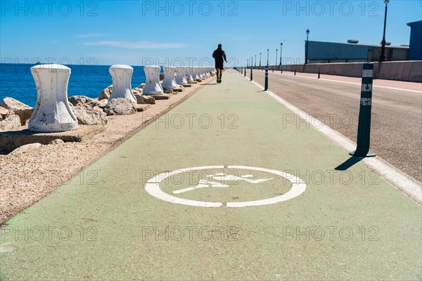 Moll de Llevant waterfront promenade, a 4.5 km long promenade for joggers, walkers, cyclists and